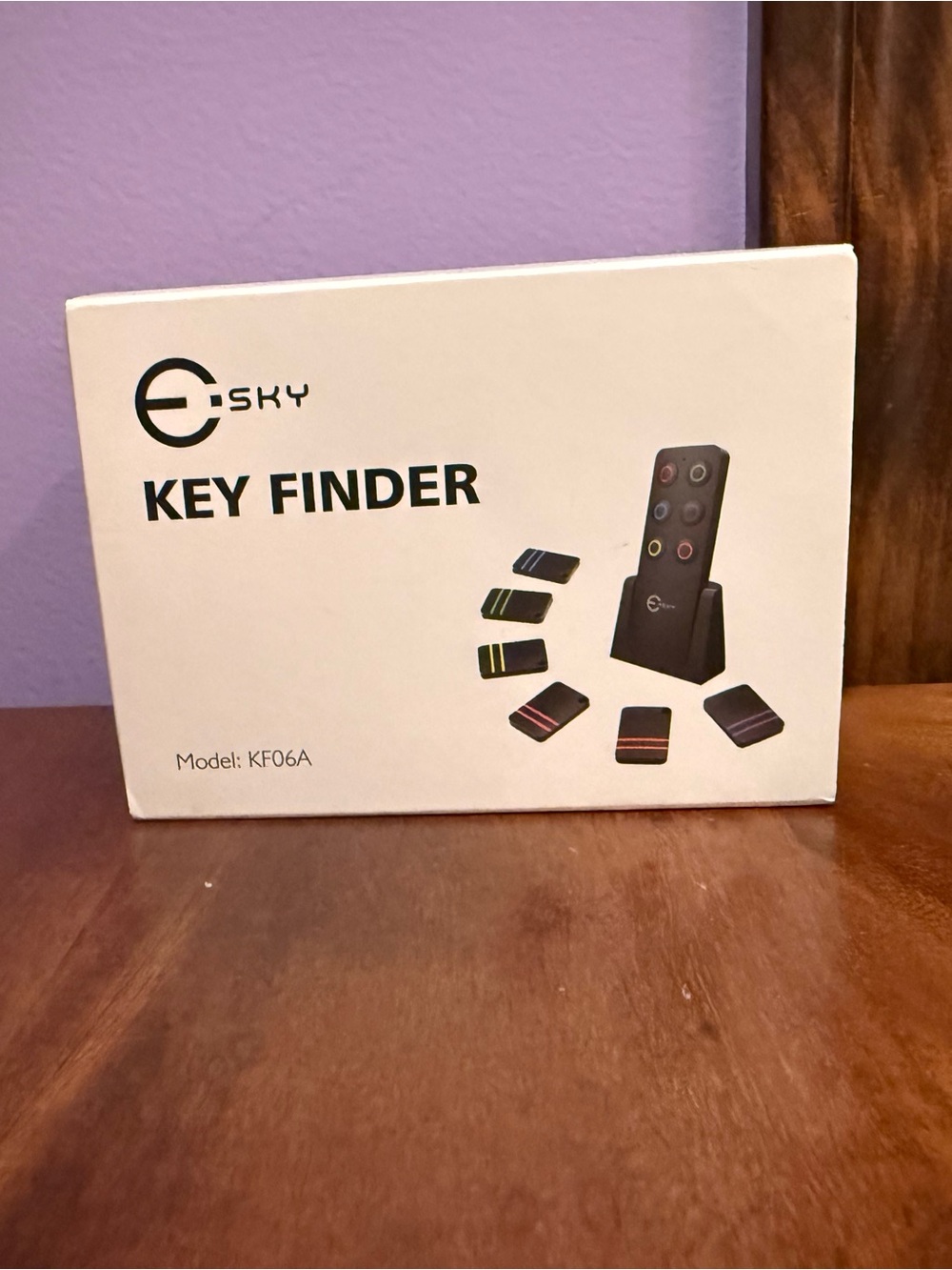 Sky Key Finder White Box with Black and Color-Accented Remotes
